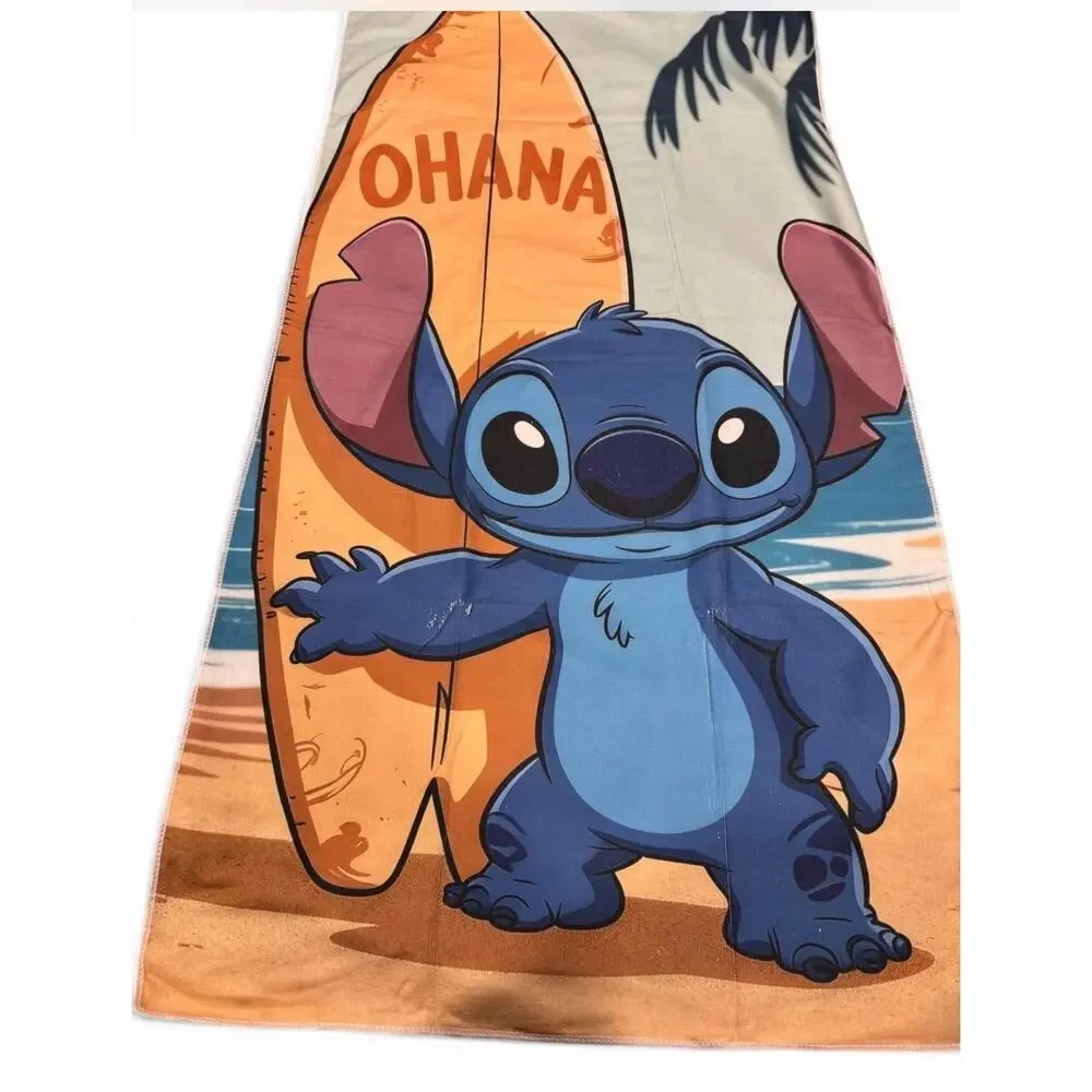 Stitch beach towel with Stitch holding a surfboard with the word 'OHANA'